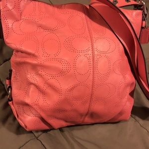 Blush /pink perforated Coach purse